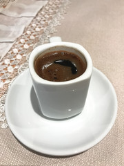 Cup of coffee on table