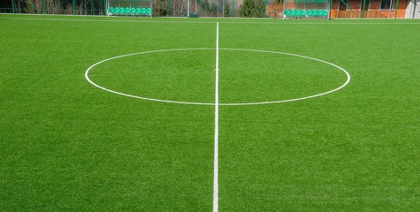Obraz premium football field with synthetic grass