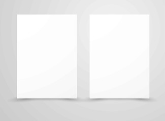 Two blank and white sheets of paper isolated