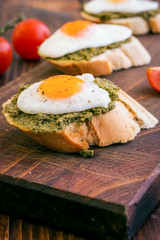 Sandwich With Fried Eggs and Pesto Sauce