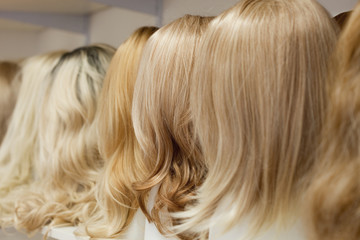 Row of Mannequin Heads with Wigs - 141207877