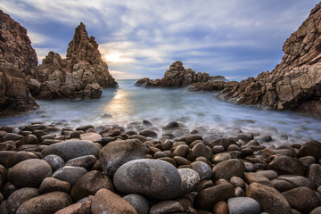 A Long Exposure sunset in the stony beach, Capo Pecora, Buggerru, Sardinia