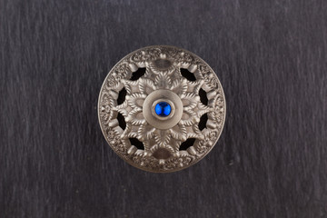 Silver Oriental Artisitc Arabian Oud Perfume / Arabian Oud Perfume with Oud Scented Wood burned in the background with Scented Smoke in the Air 