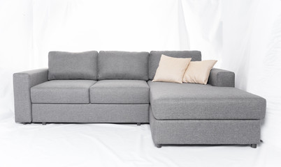 Studio shot of a grey modern sofa isolated on white background