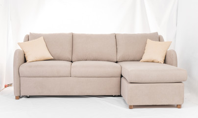 Studio shot of a grey modern sofa isolated on white background