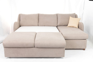 Studio shot of a grey modern sofa isolated on white background