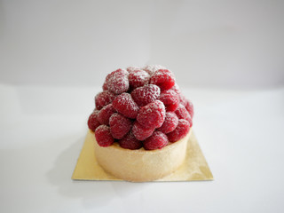 Close up raspberry tart with white background