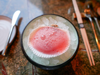 Cold pink Amuse Bouche served on ice