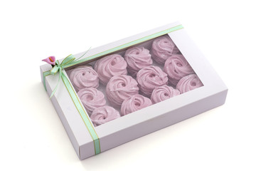 Pink zephyr in gift box on white background