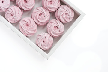 Pink zephyr in gift box on white background
