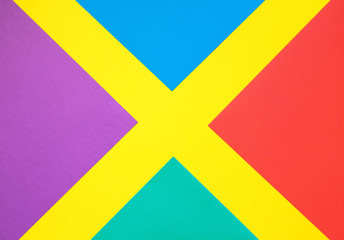Composition in the form of X. Purple, blue, pink and yellow sheets