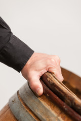Male hand holding barrel