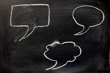blank bubble speech as comic dialog on blackboard background