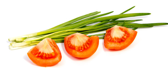 red tomatoes and Young fresh onion isolated on white background