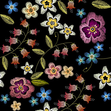 Embroidery flowers seamless pattern. Fashionable template for design of clothes