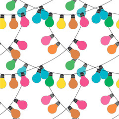 Vector seamless festive background with a pattern of color garlands light bulbs