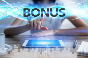 Woman using tablet pc, pressing on virtual screen and selecting bonus.
