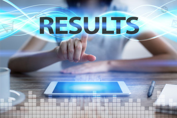 Woman using tablet pc, pressing on virtual screen and selecting results.