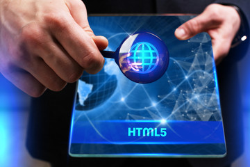 Business, Technology, Internet and network concept. Young businessman working on a virtual screen of the future and sees the inscription: HTML5