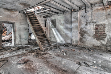 Staircase in old, abandoned and crumbling building