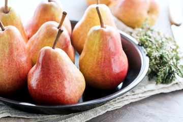 Fresh ripe pears on a plate Horizontal photo Close up 