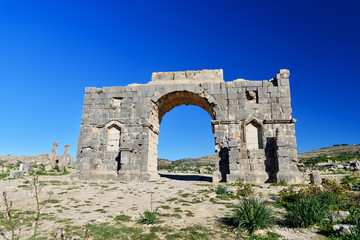 Arch of Caracalla in Roman ruins, ancient Roman city of Volubilis. Morocco