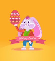 Rabbit in clothes, holding an Easter egg in his hand.