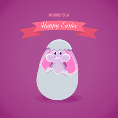 A festive hare looks out from a cracked egg.