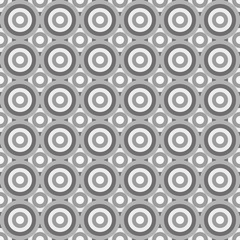 Seamless greyscale pattern made by circles in greyscale, shades of grey