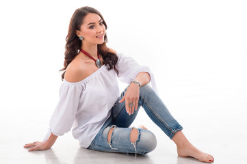 studio Portrait of gorgeous model wearing beautiful jewellery. White background