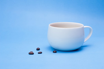 Coffee mug on a blue backdrop