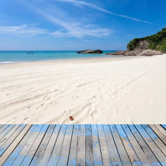 wooden floor with beautiful sand ,tropical beach ,blue sky scenery for background