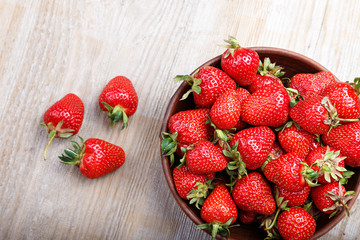plate with ripe strawberries