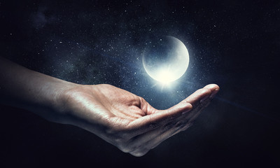 Moon planet in hand . Mixed media
