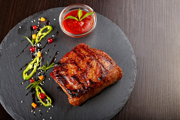 Steak on slate blackboard