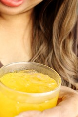 Woman drinkig orange juice