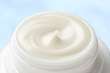 Close-up of cream blue background