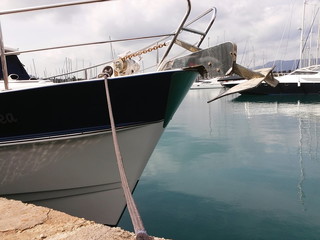 sailing motor boat in marina