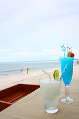 Cocktails for two on a beach holiday
