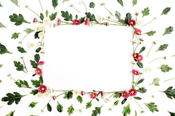 Frame wreath with red and white wildflowers, green leaves, branches on white background. Flat lay, top view. Flower background.