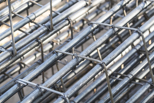 Steel bars that bind together for use in building construction.