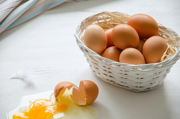 Basket with beige eggs