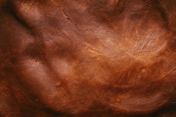 Naklejka premium Handmade background from color plasticine. Macro shot.