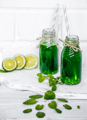 green smoothie on white background