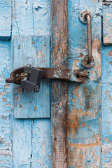 The old door locked with a padlock hanging brackets. Set of backgrounds