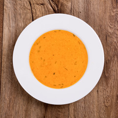 Vegetable soup on a wooden table