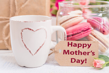 Mother's day card with coffee, present and macaroons