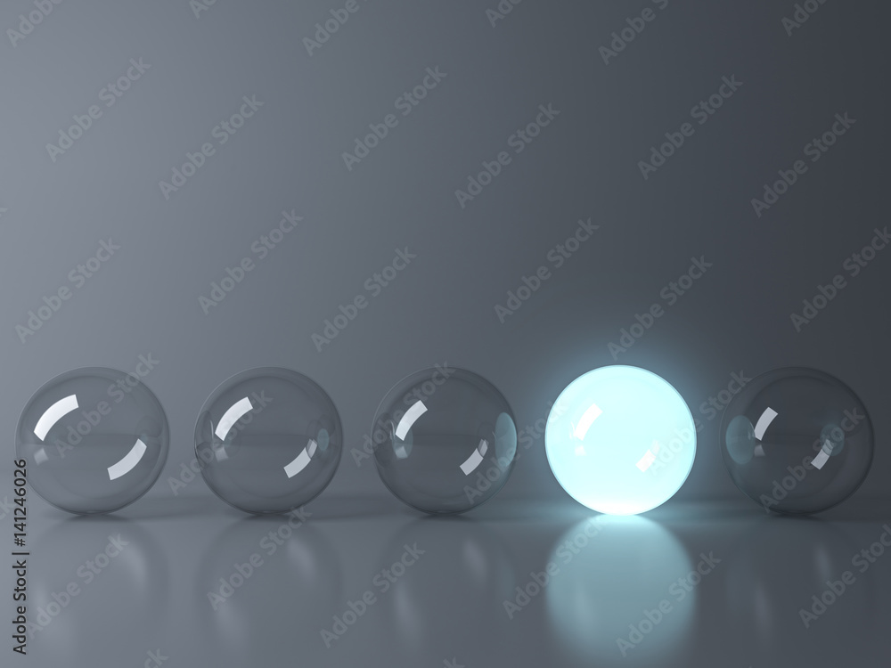 Poster one blue glowing light ball standing out from the unlit glass balls on dark grey background with ref