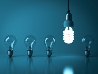One hanging eco energy saving light bulb glowing from the unlit incandescent bulbs with reflection , stand out from the crowd , leadership and different business creative idea concept . 3D rendering.