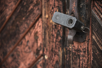 The old door locked with a padlock hanging brackets. Set of backgrounds